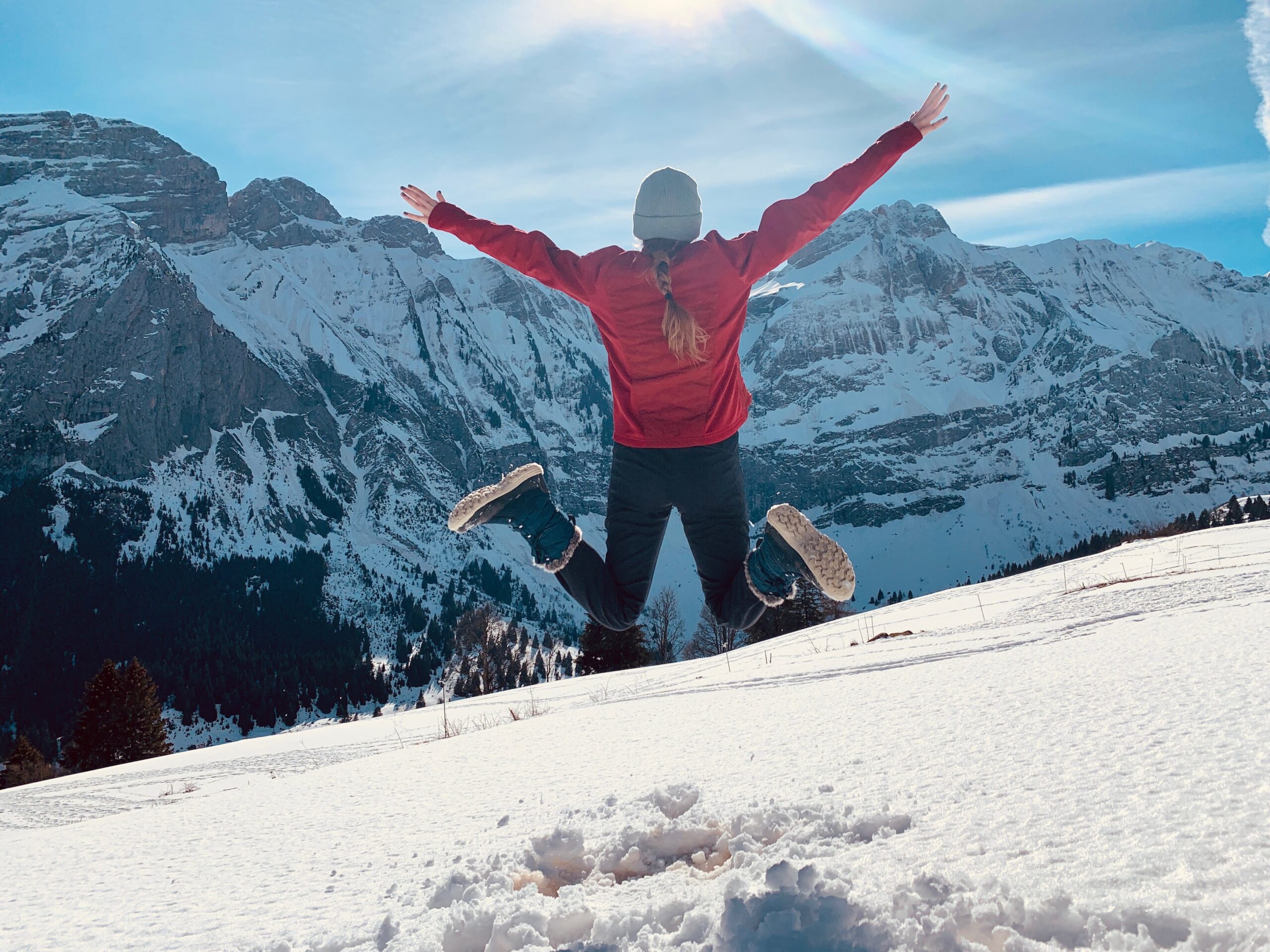jumping in the snow in the french alps